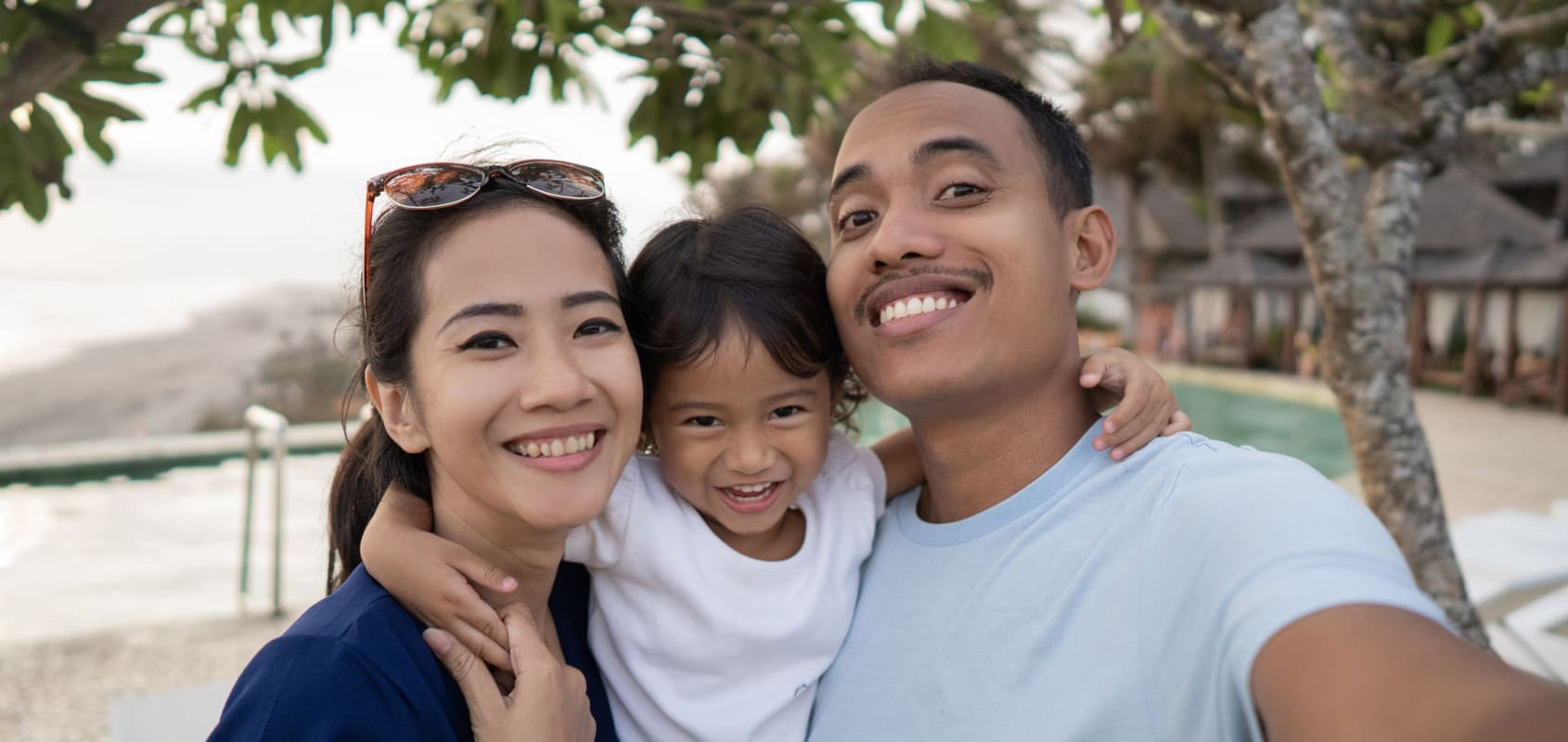 Happy Asian family with kid under 6 years old